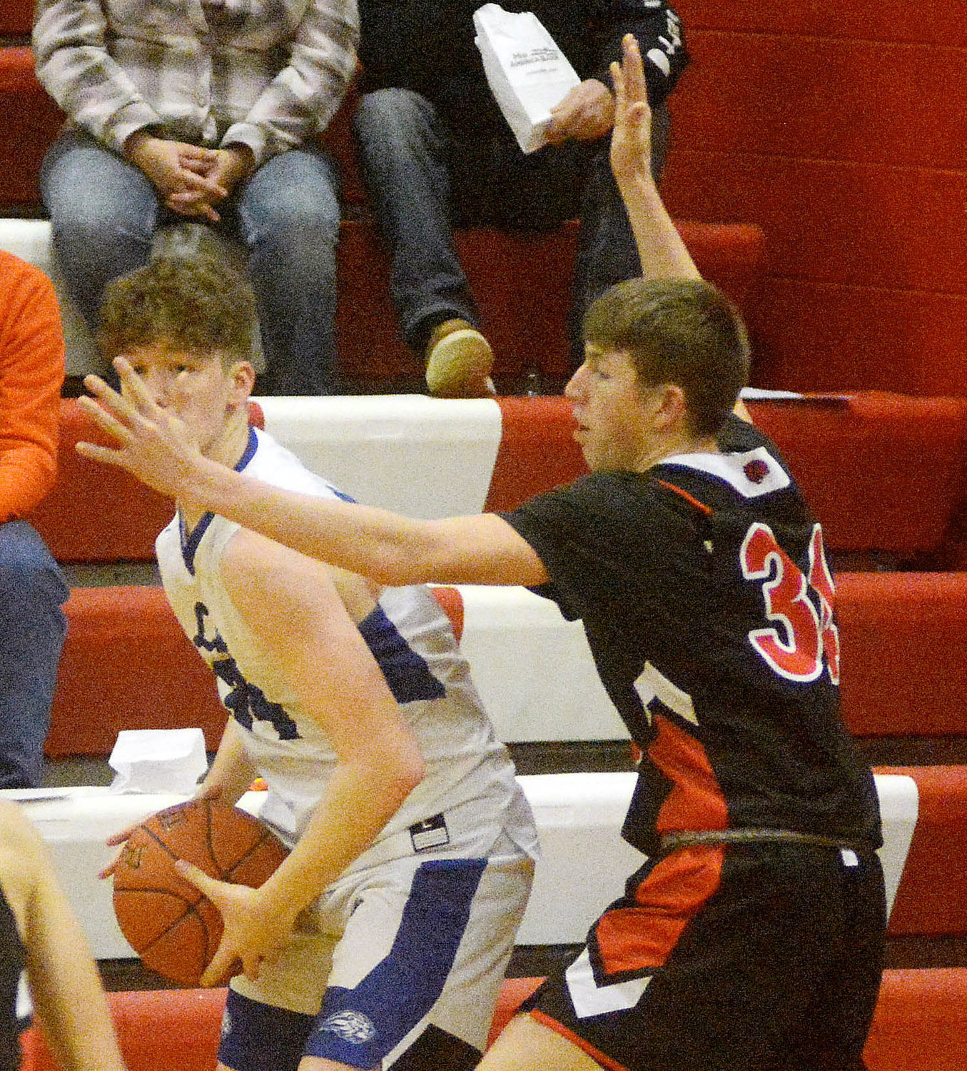 Baylar Smith (far right) plays defense during the Belle Tournament against Crocker.